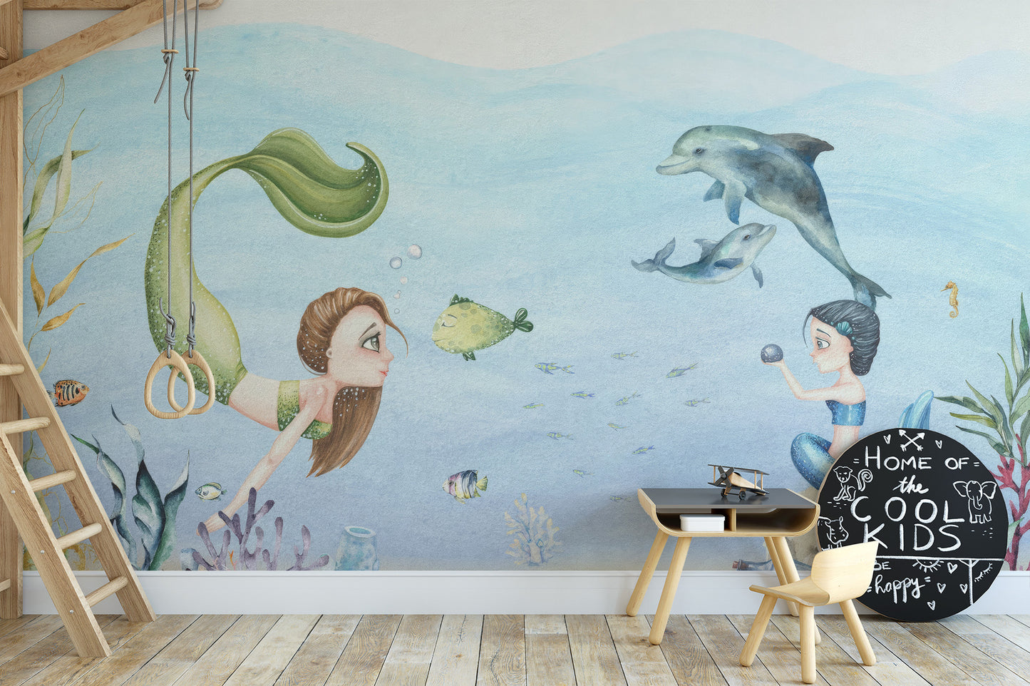 Playful girls room mural with colorful mermaids and sea creatures