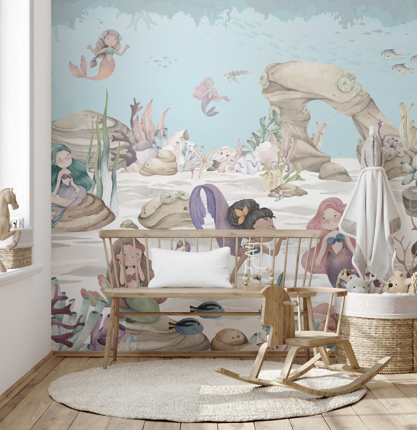 Dreamy underwater mural showcasing mermaids and sea creatures