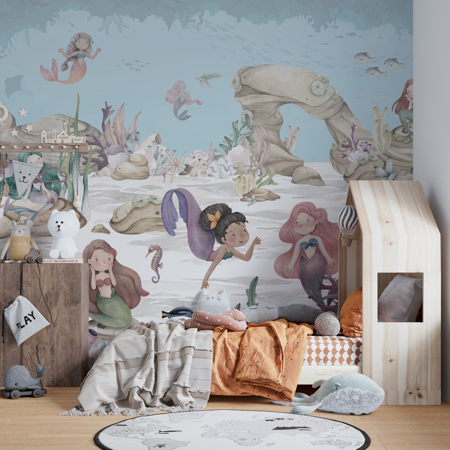 Mermaid-themed mural with colorful ocean elements for children