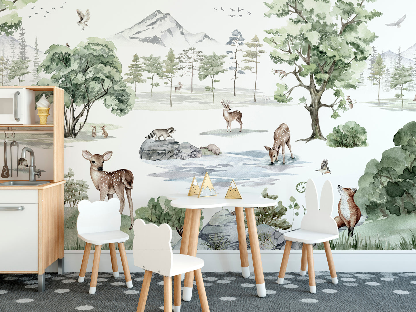 Scenic forest mural featuring deer in a snowy setting.