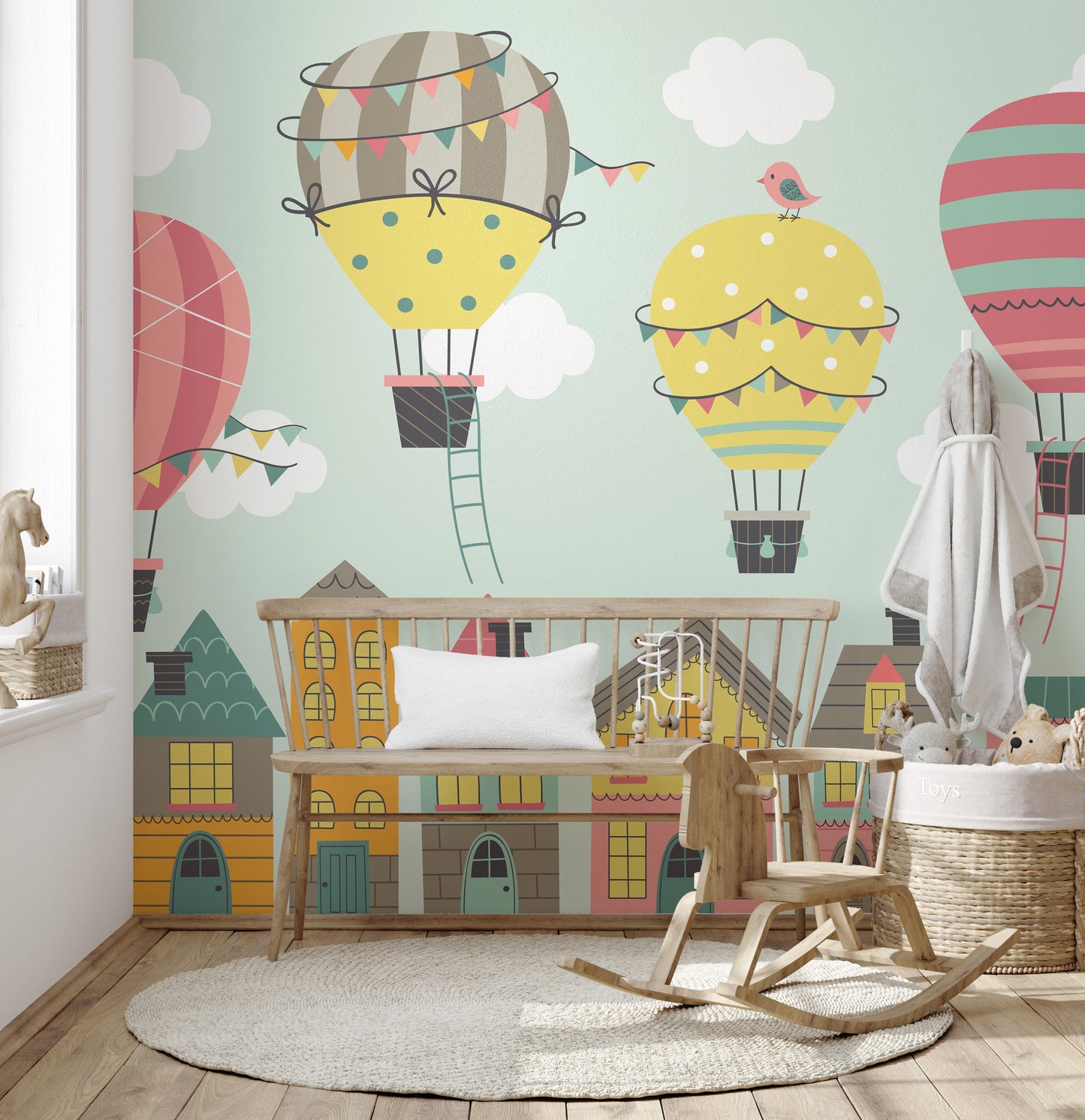 Imaginative nursery mural with floating, whimsical balloons.