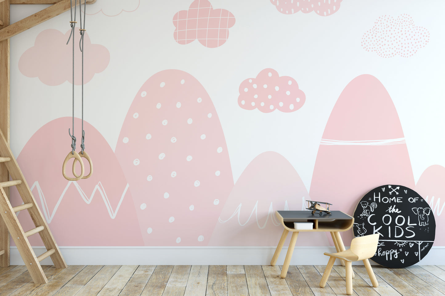 Pink misty mountains wall mural creating a tranquil ambiance.