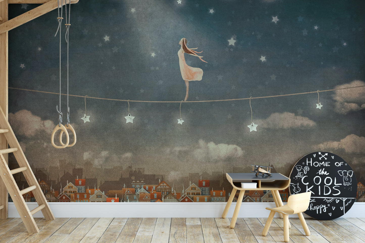 Starry night mural featuring charming houses for kids’ rooms.
