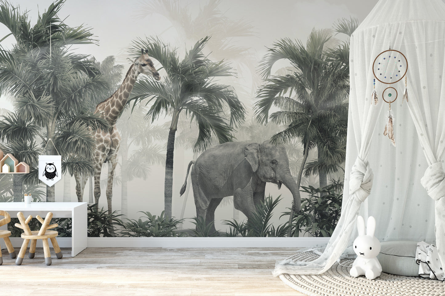Safari-themed wall mural featuring giraffes and elephants.