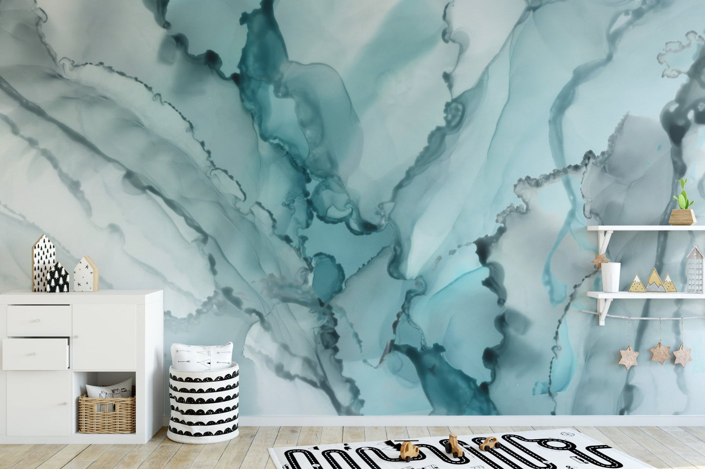 Aqua Ink Marble Abstracts wall mural behind a white cabinet in a minimalist kids room.