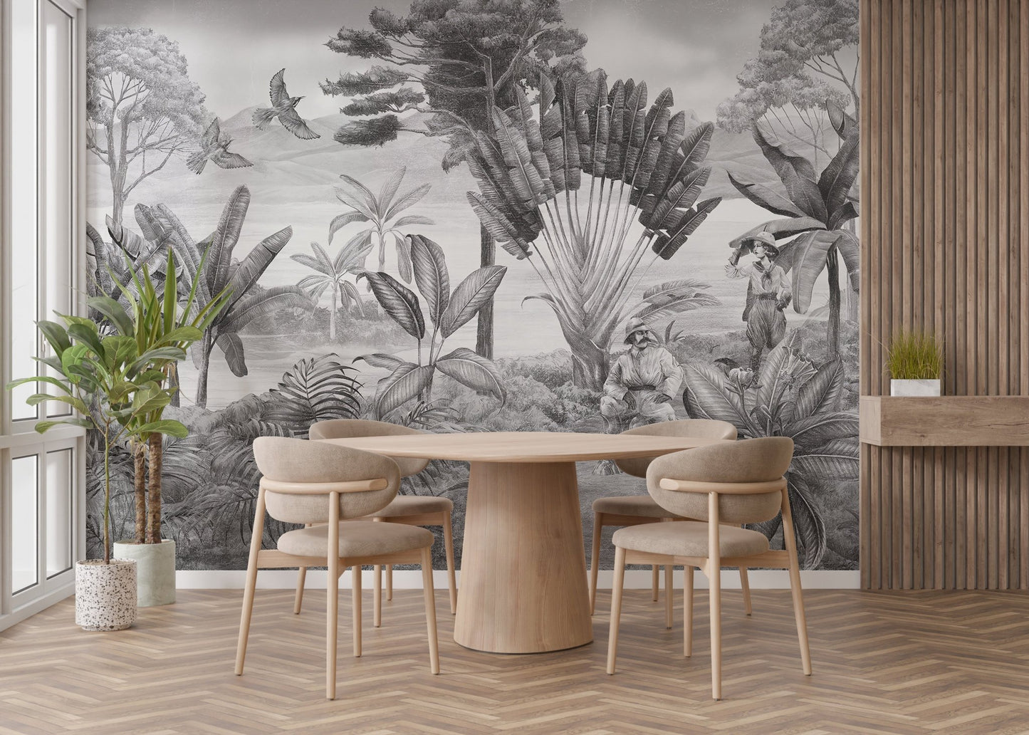 Black and white scenery wall mural in a dining area with a round wooden table.