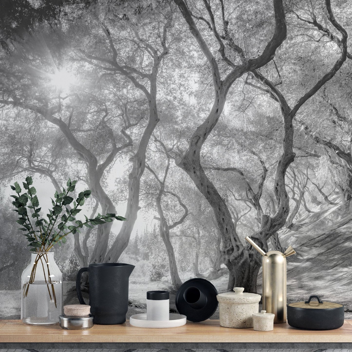 Black & white forest wall mural featuring olive trees in kitchen backdrop.