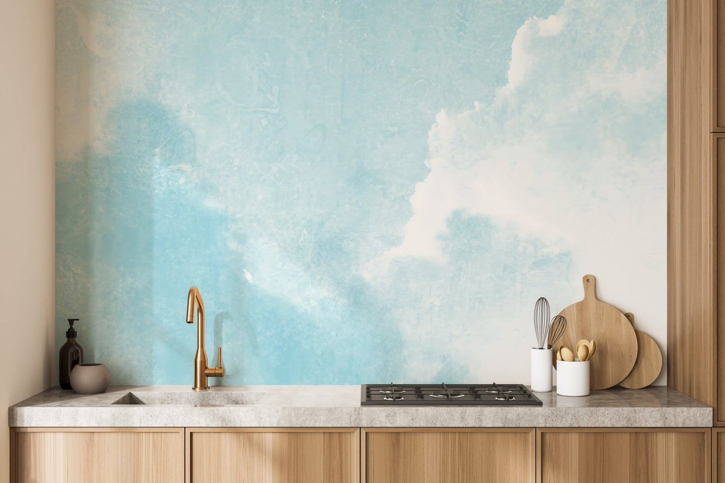 Kitchen backsplash area featuring a blue clouds wall mural.
