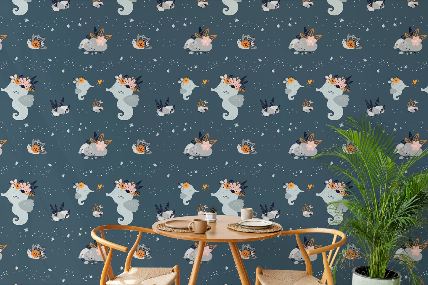 Dark blue ocean theme wallpaper behind a small dining table and green plant.