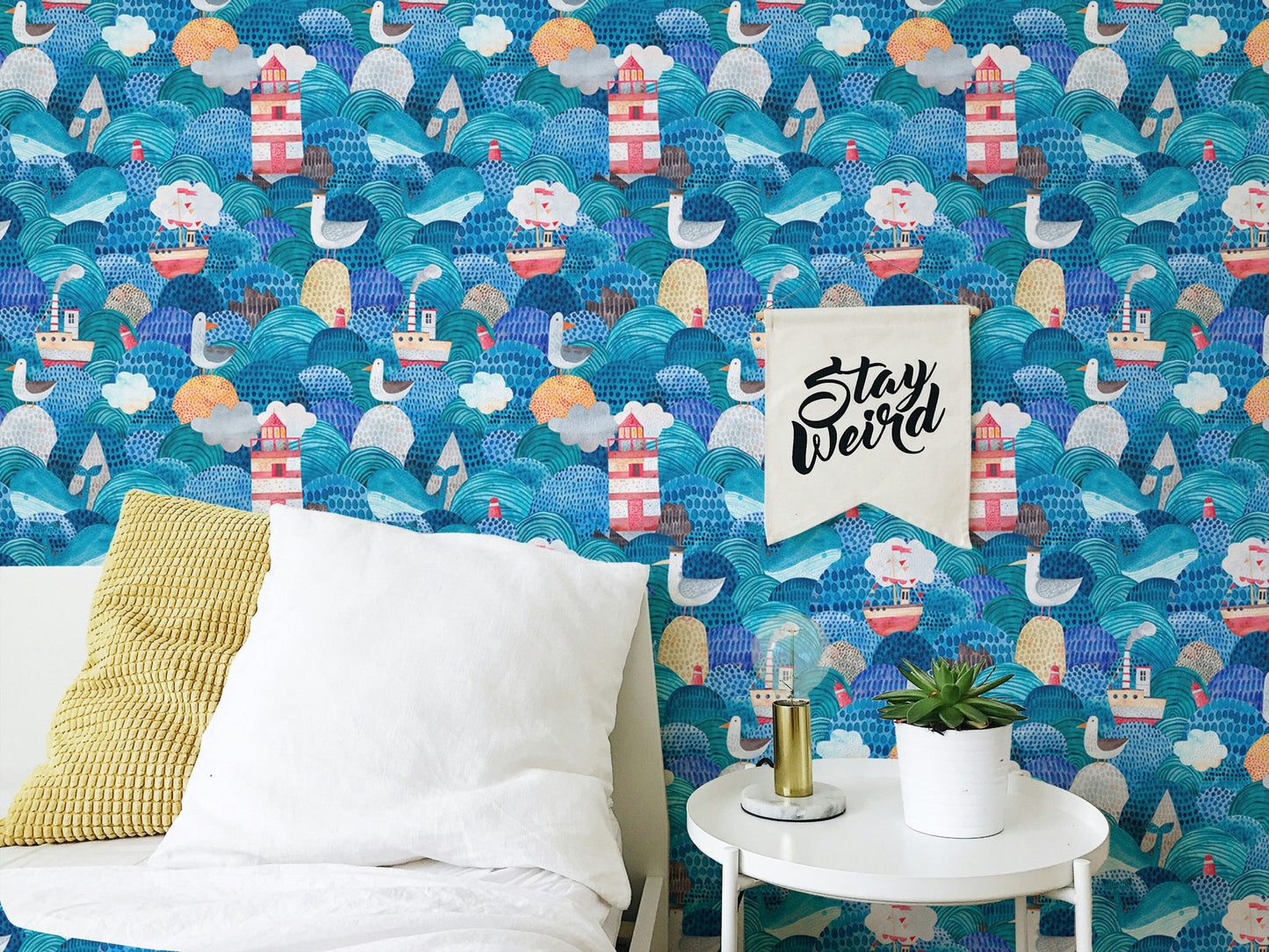 Minimalist bedroom with Cute Watercolor Ships and Lighthouse Waves Blue Wallpaper.