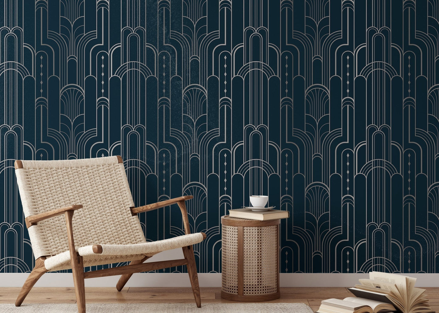 Symmetrical art wallpaper behind a wooden armchair and side table.