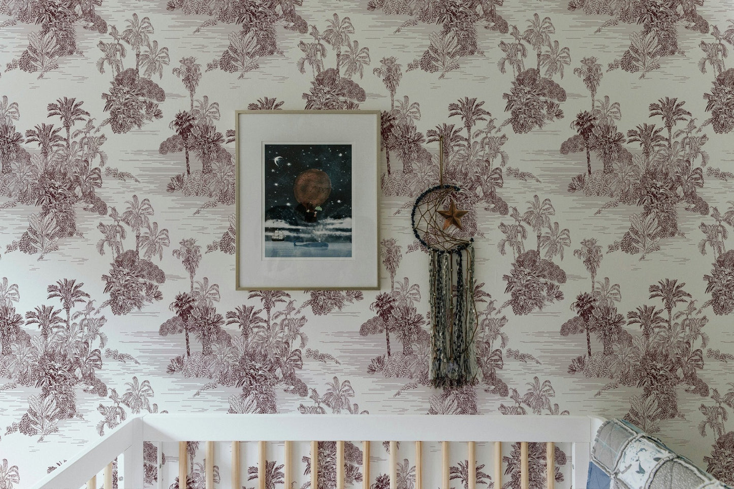 Detailed botanical wallpaper with brown palm tree sketches and a wall frame.