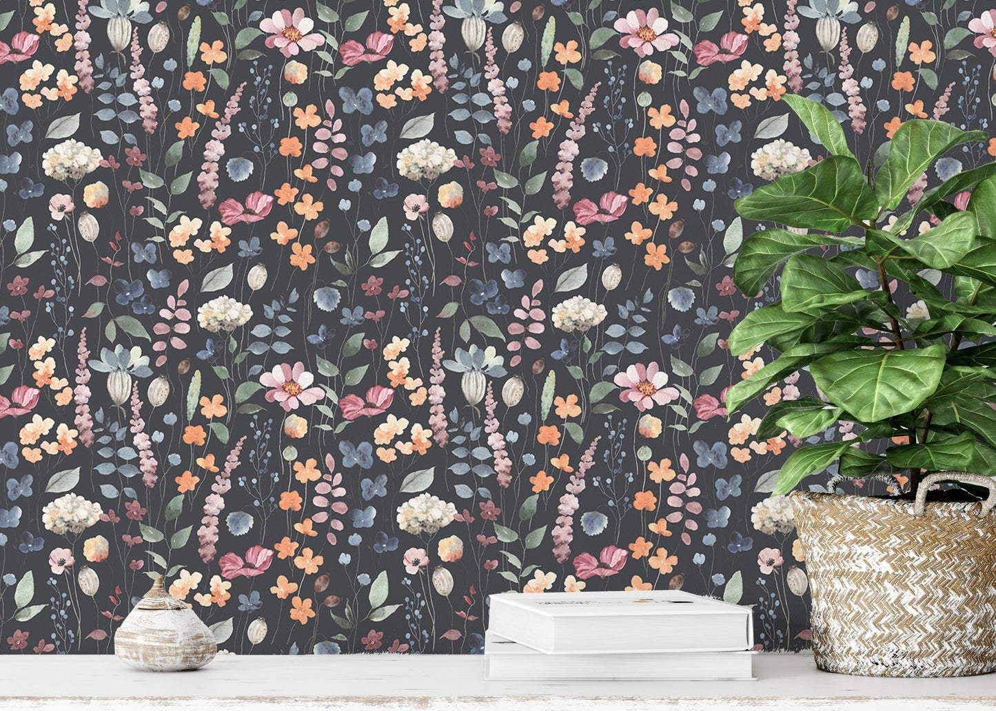 Minimalist room with dark blue floral wallpaper and a small green potted plant.