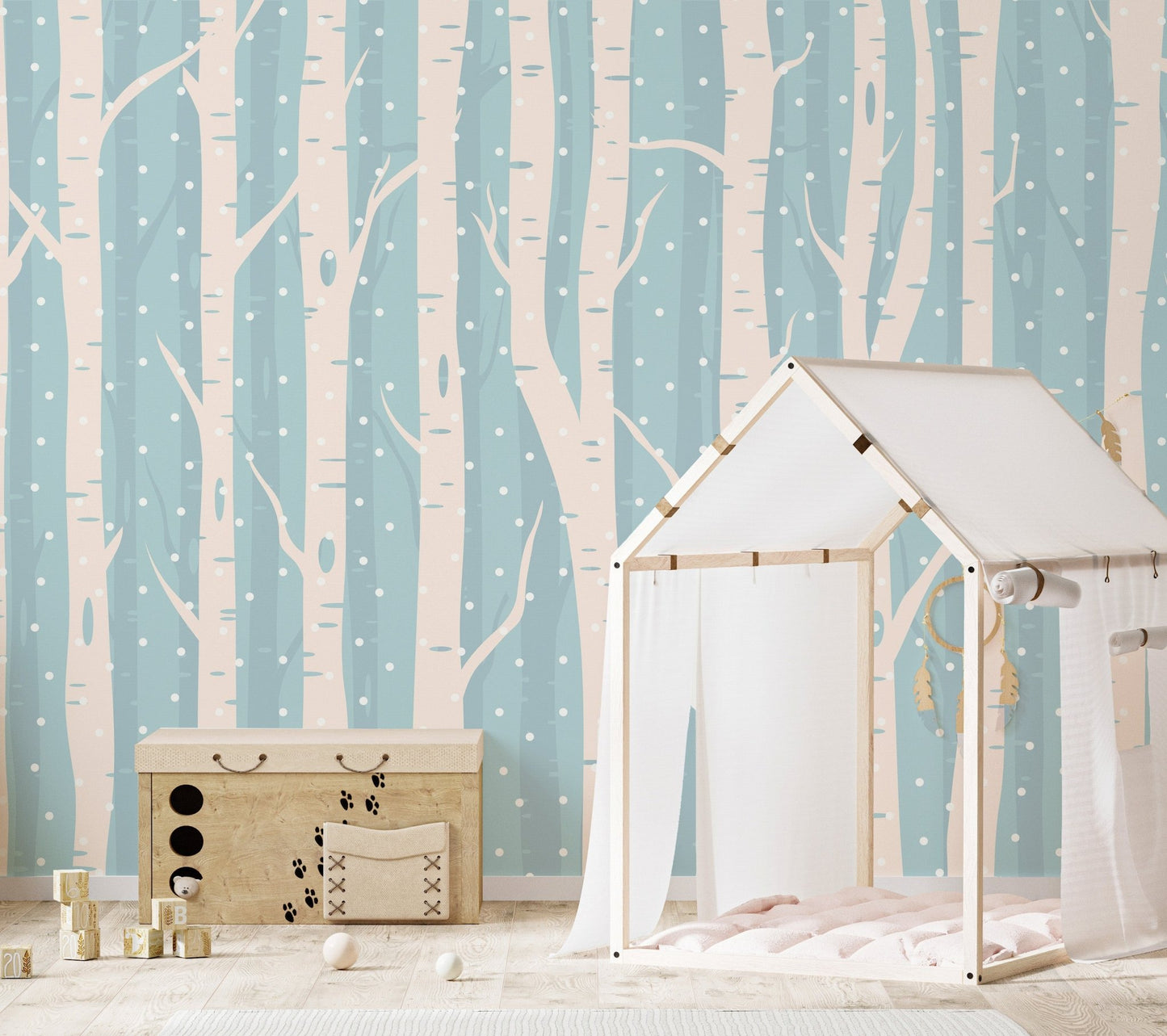 Vertical birch forest wall mural in a playroom with a wooden toy house and floor mat.