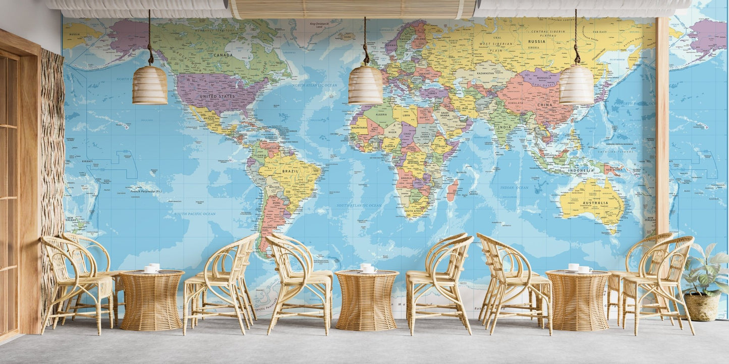 Artistic world map wall mural featuring globe explorer theme in cafe area.