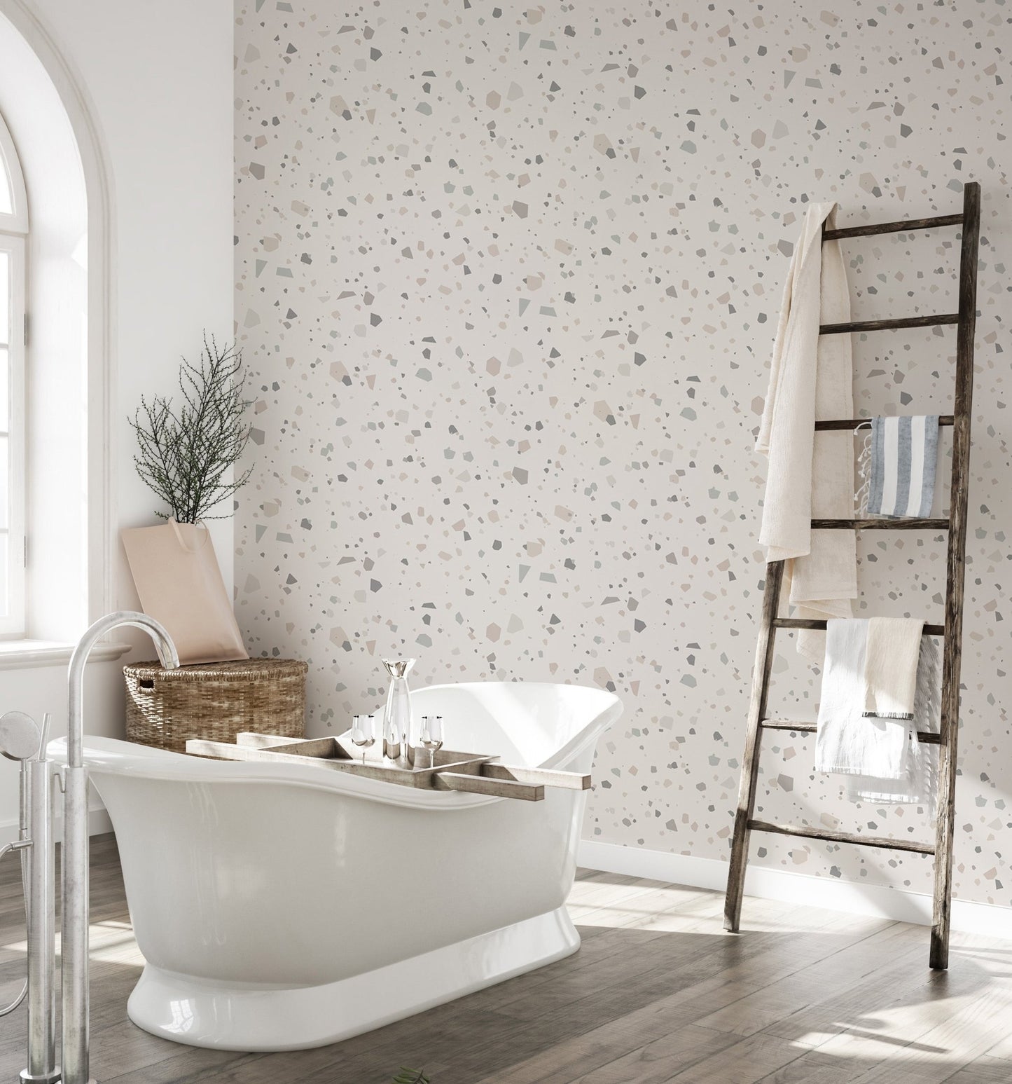 Natural stone pattern wall mural in a bathroom with a white freestanding tub.