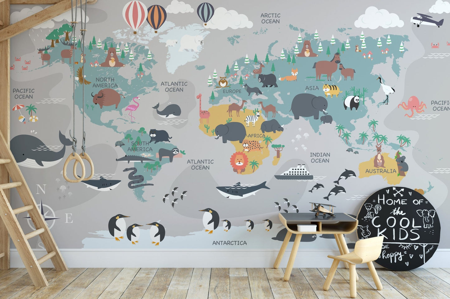 Study area feature wall mural with animals and continents on map.
