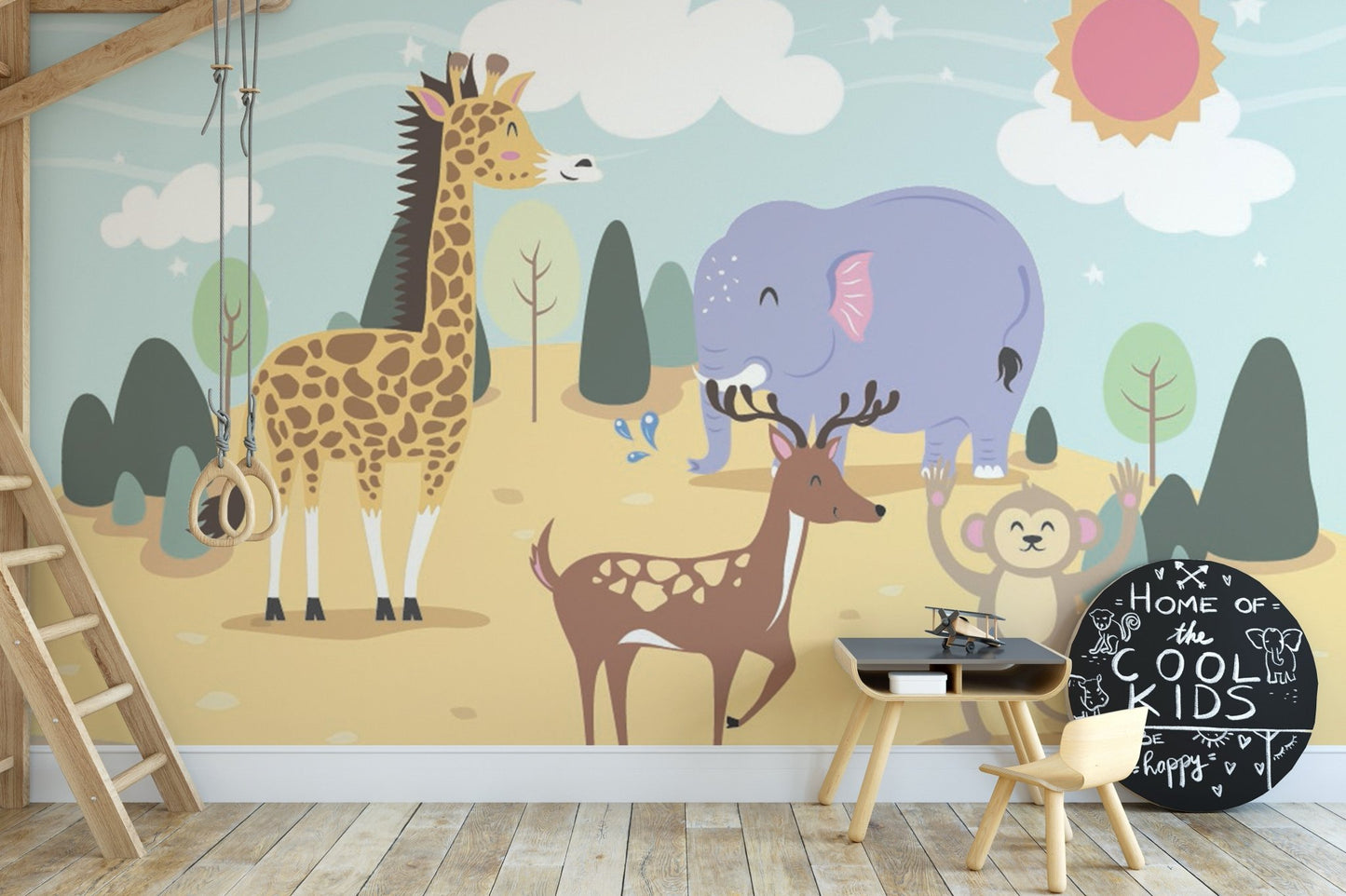 Cartoon jungle wall mural with a giraffe next to a wooden ladder.