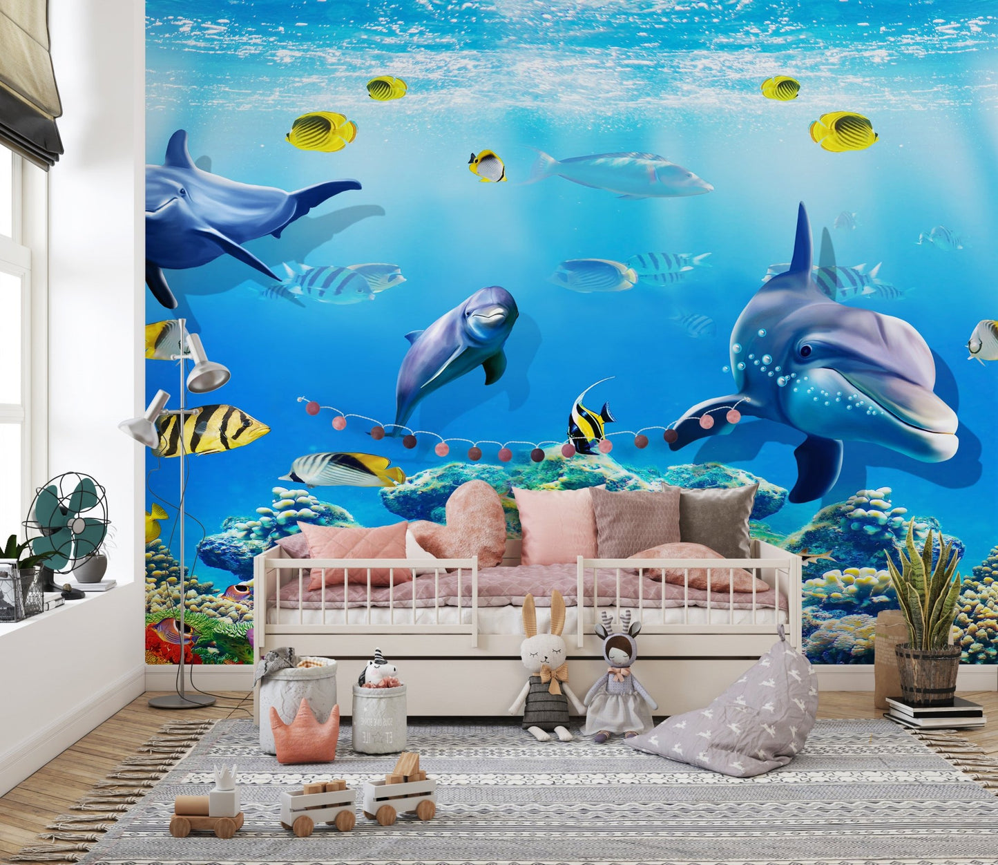 Dolphin magic mural for walls in a playful bedroom with light wood furniture