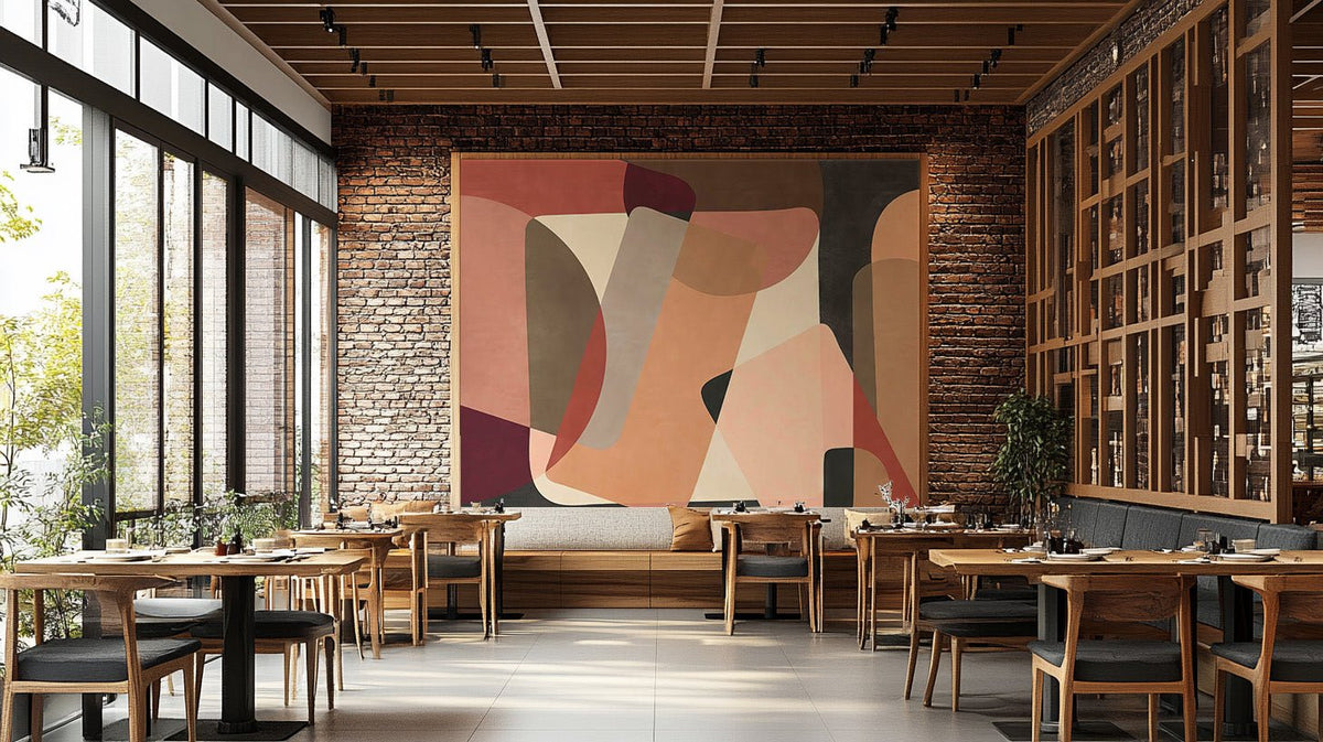 Contemporary wall mural with soft peach, charcoal, and beige geometric art.