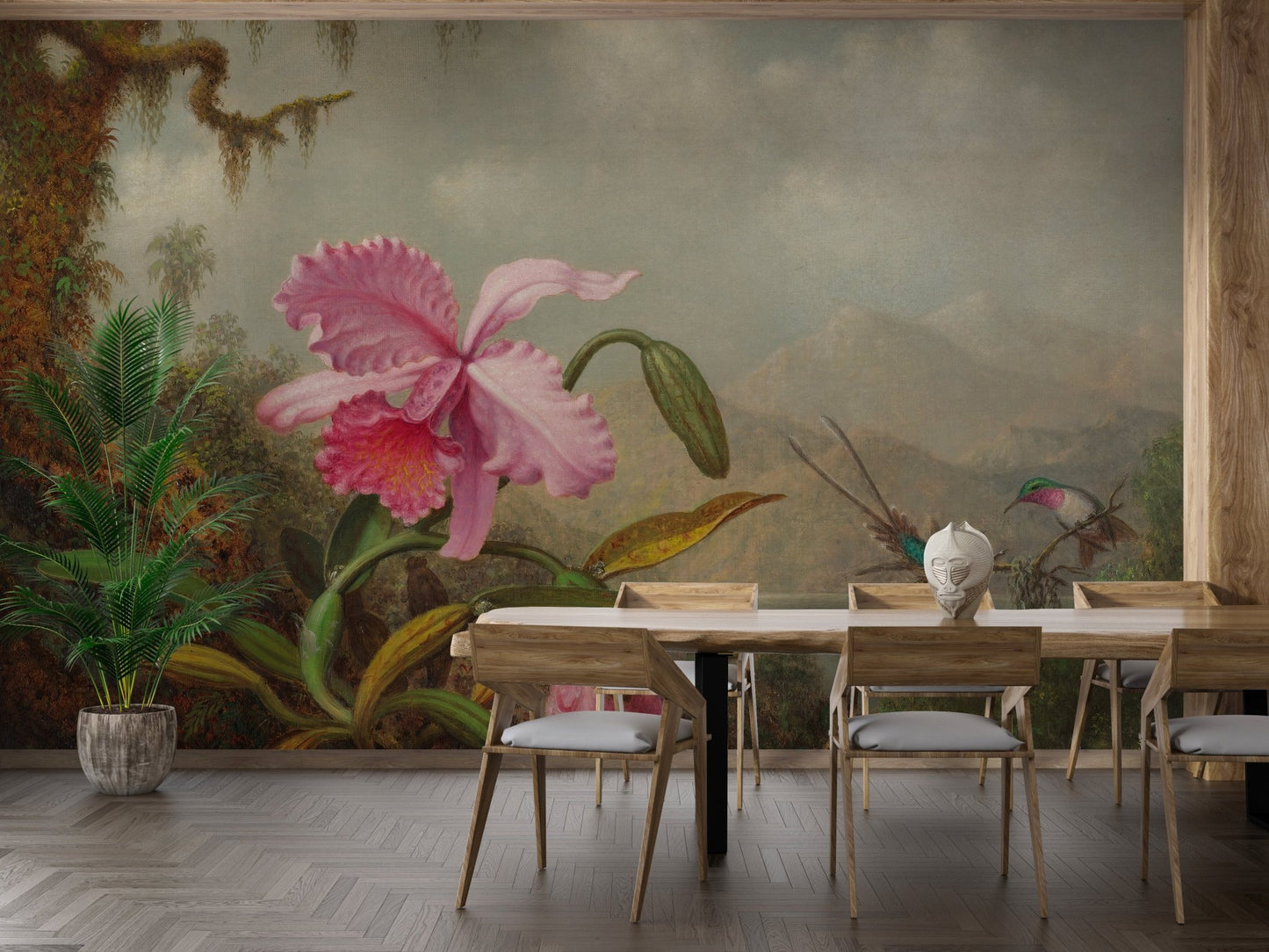 Tropical flower wall mural in a dining area with a long wooden table.