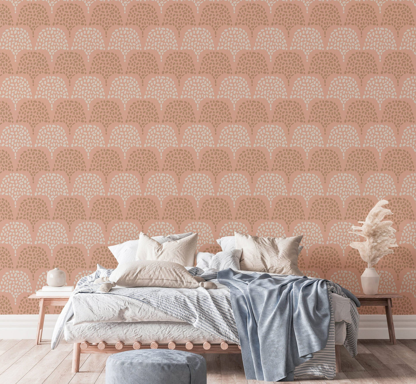 Symmetrical arch pattern wallpaper in a bright bedroom.