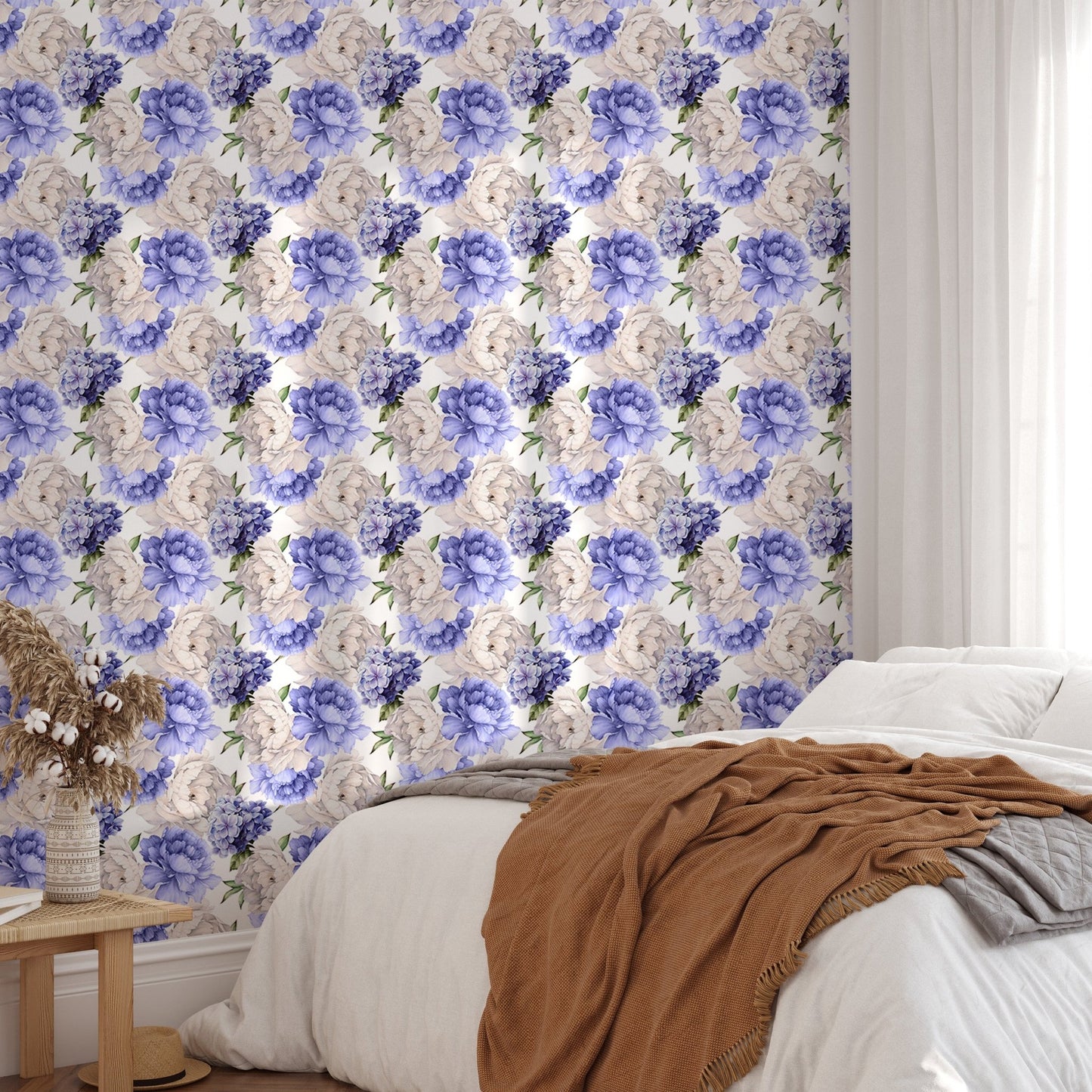 Purple peonies flower wallpaper in a bedroom with a brown throw blanket.