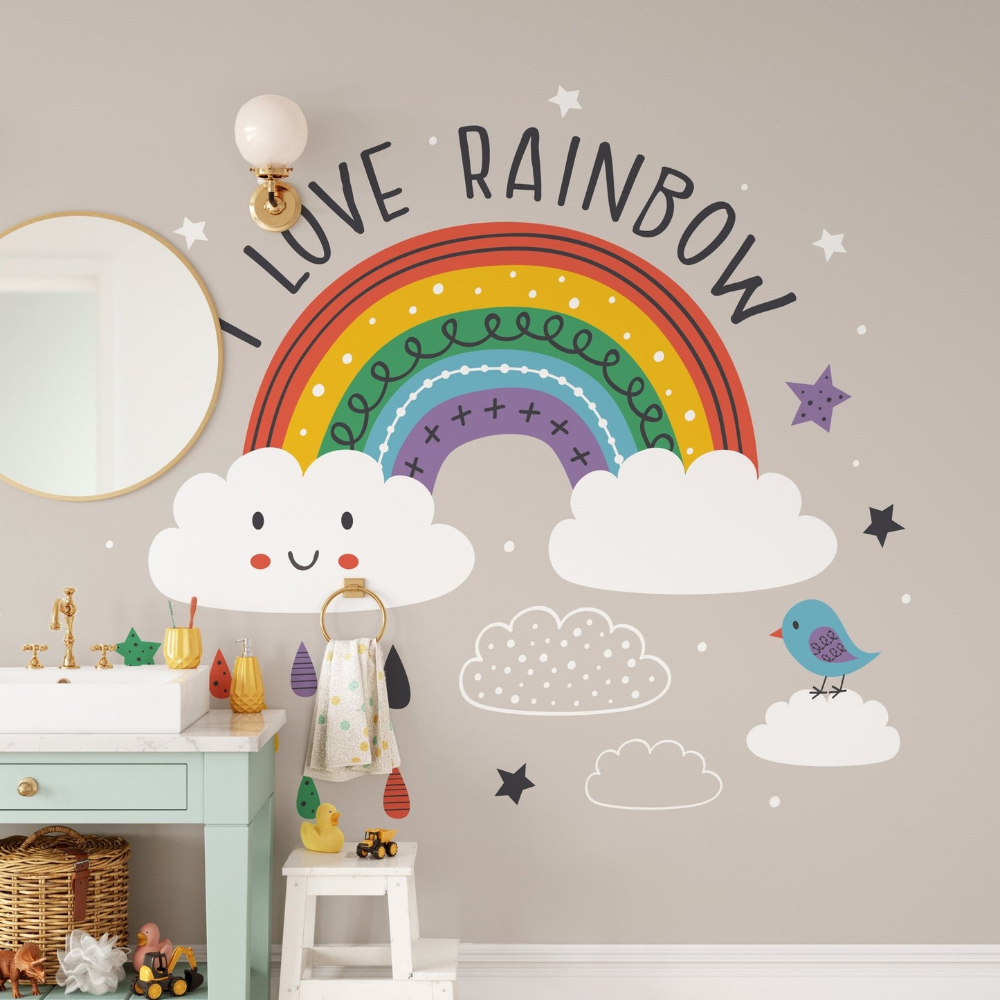 Bathroom vanity area featuring a rainbow wall mural with a circular mirror.