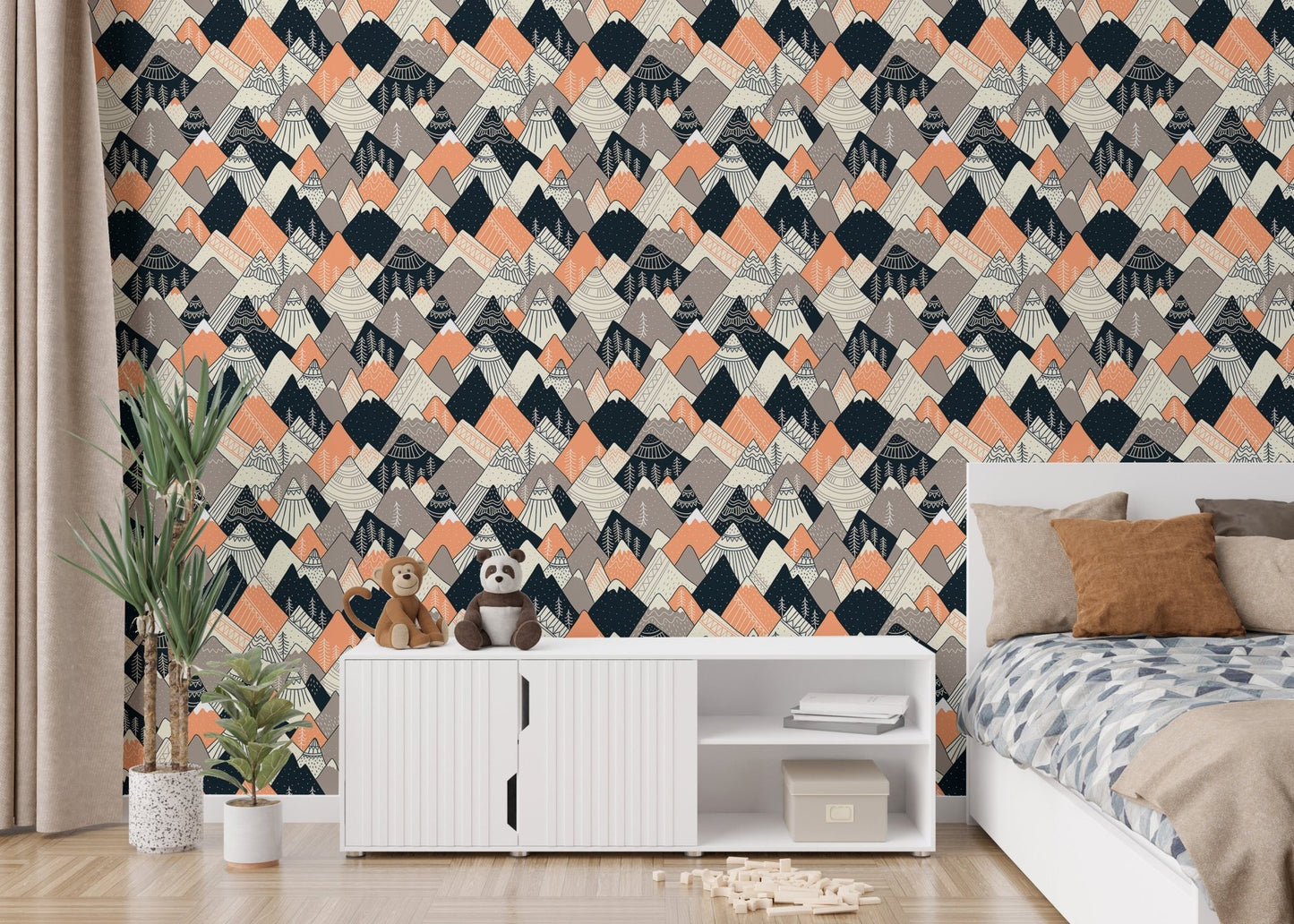 Nordic mountain wallpaper in a bedroom with white storage units.