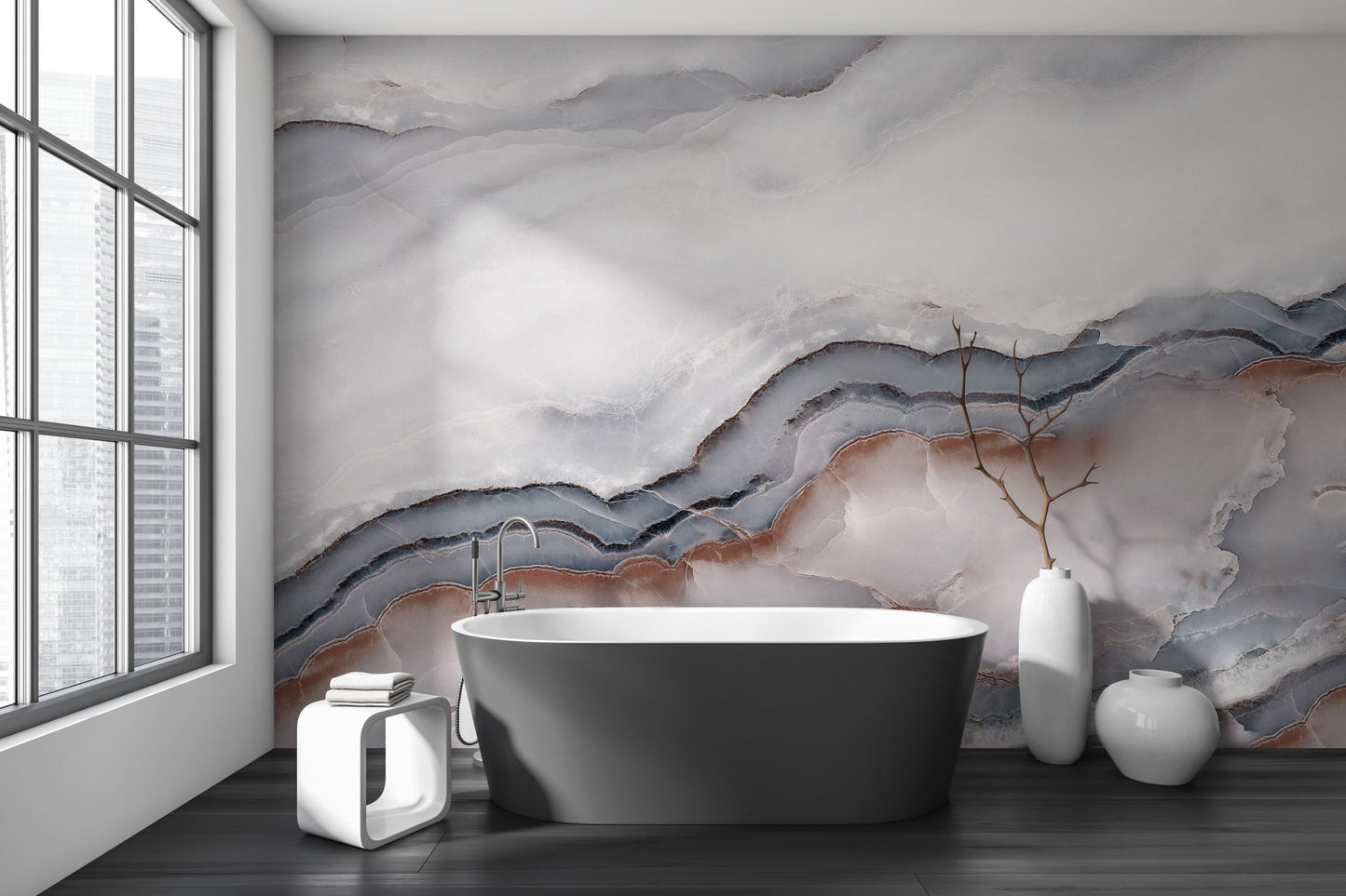 Gray and white marble wall mural in a bathroom with a black floor.