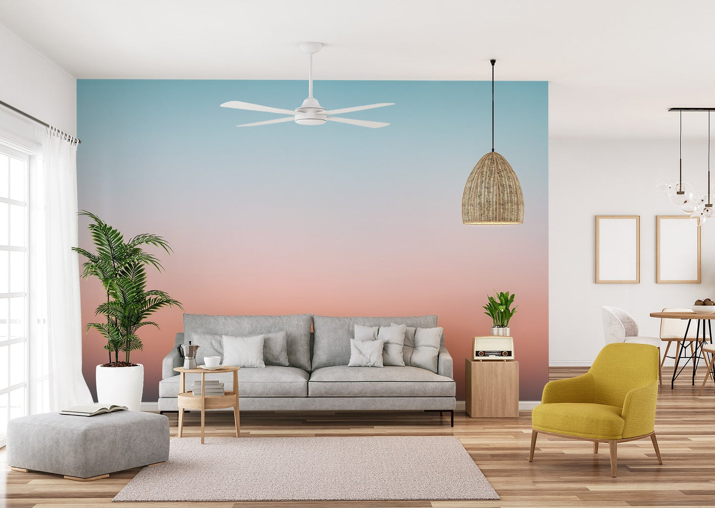 Abstract sunrise sky wall mural in muted coral and soft blue.