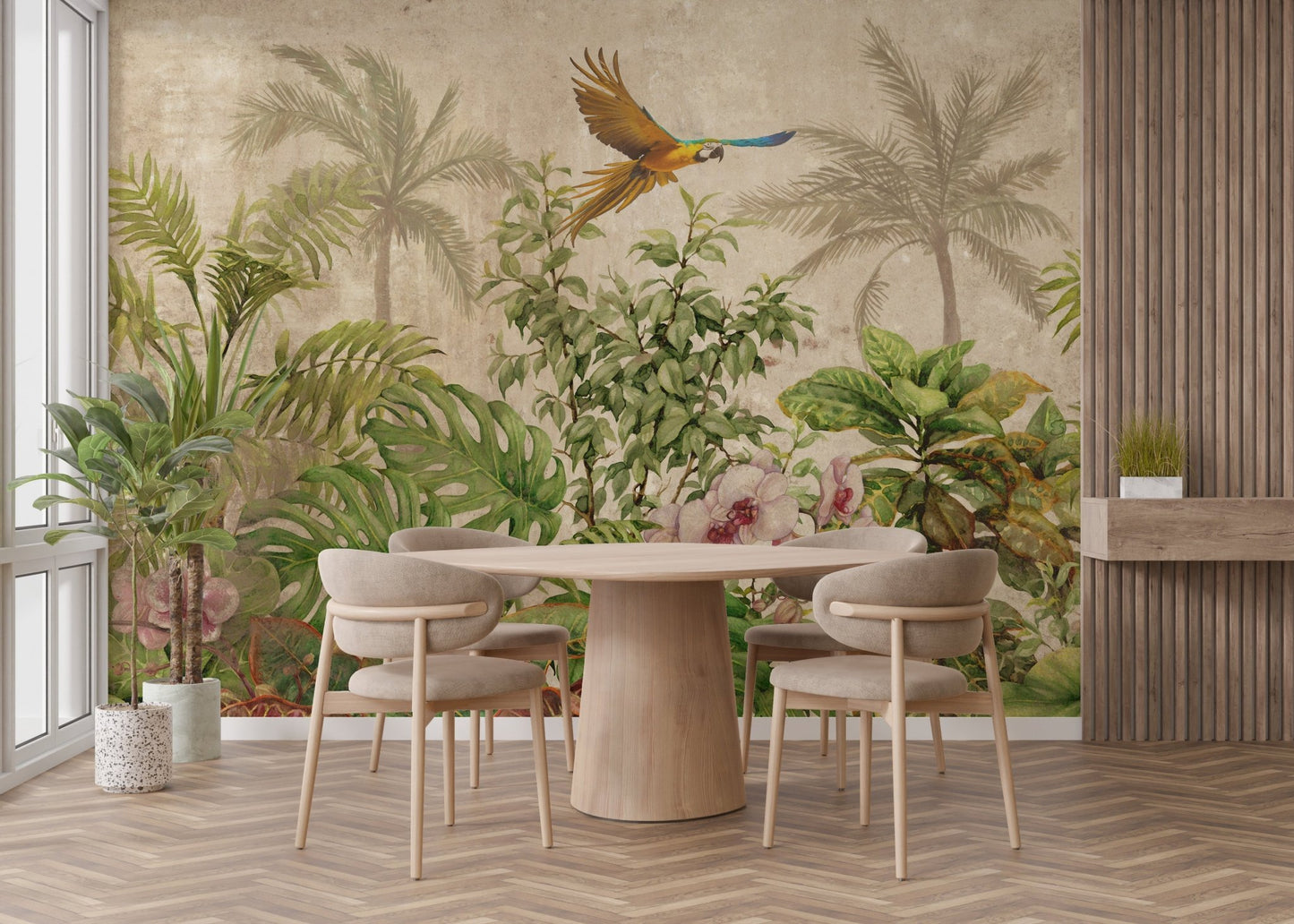 Circular dining table set in front of a green palm leaf paradise wall mural.
