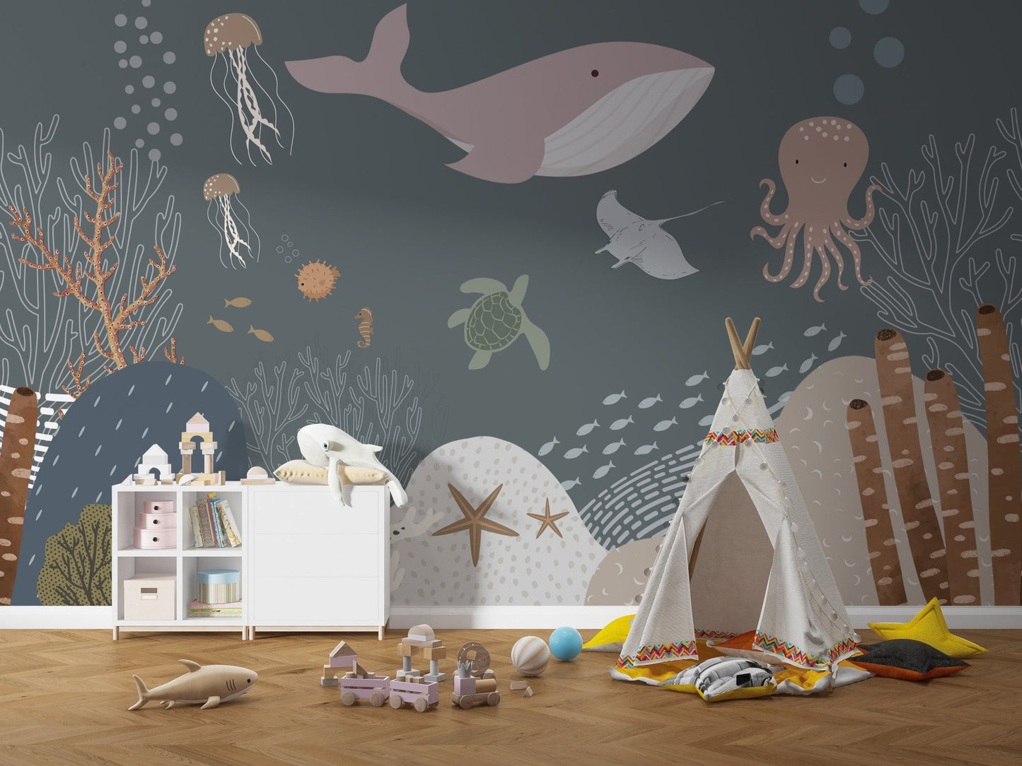 Underwater Life Wall mural behind a white teepee tent and toy storage area.