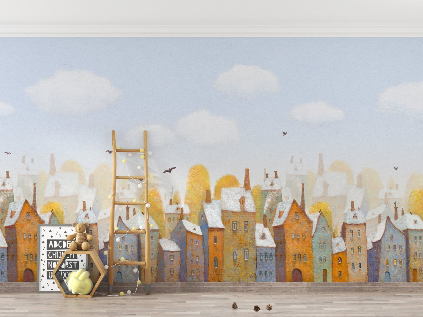 Large scale watercolor city wall mural behind a wooden toy set in a playroom.