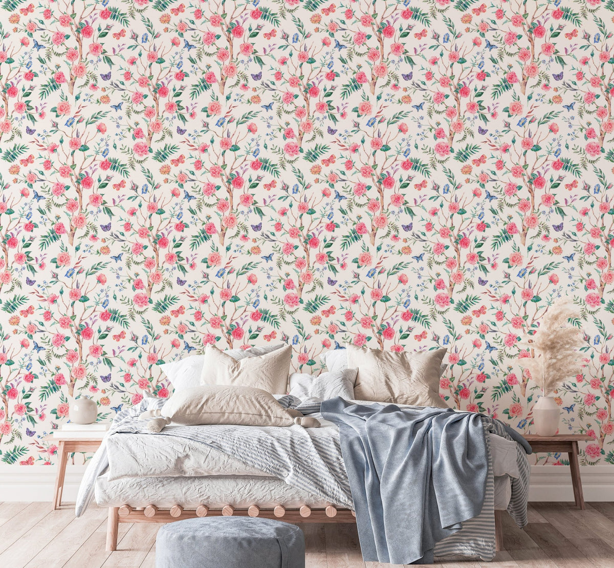 Pink rose bouquet wallpaper in a bedroom with a tan throw blanket.