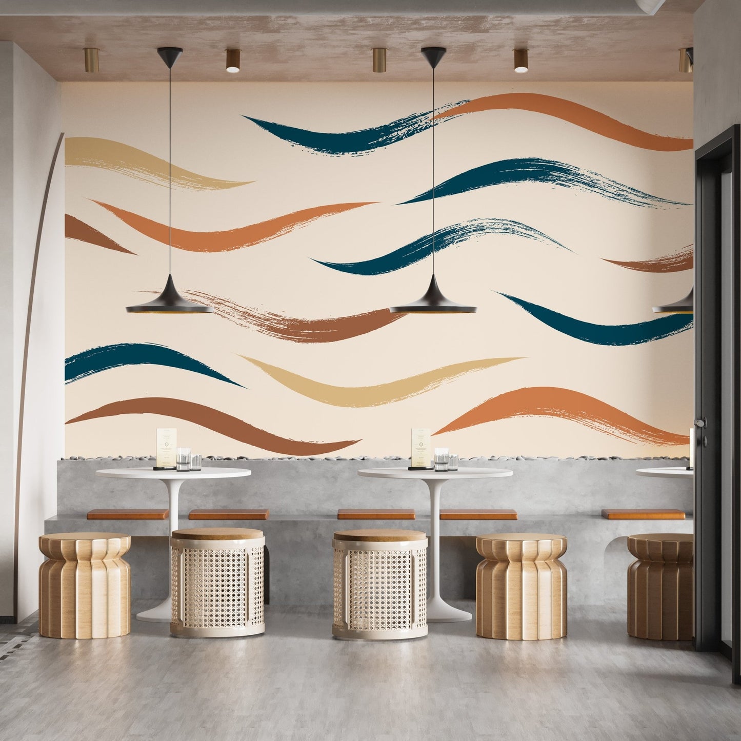Indoor restaurant space with wavy pattern mural and round wooden stools.