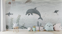 Artistic mural featuring playful dolphins in ocean waves
