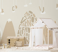 Mountain peak mural wallpaper in earthy tones
