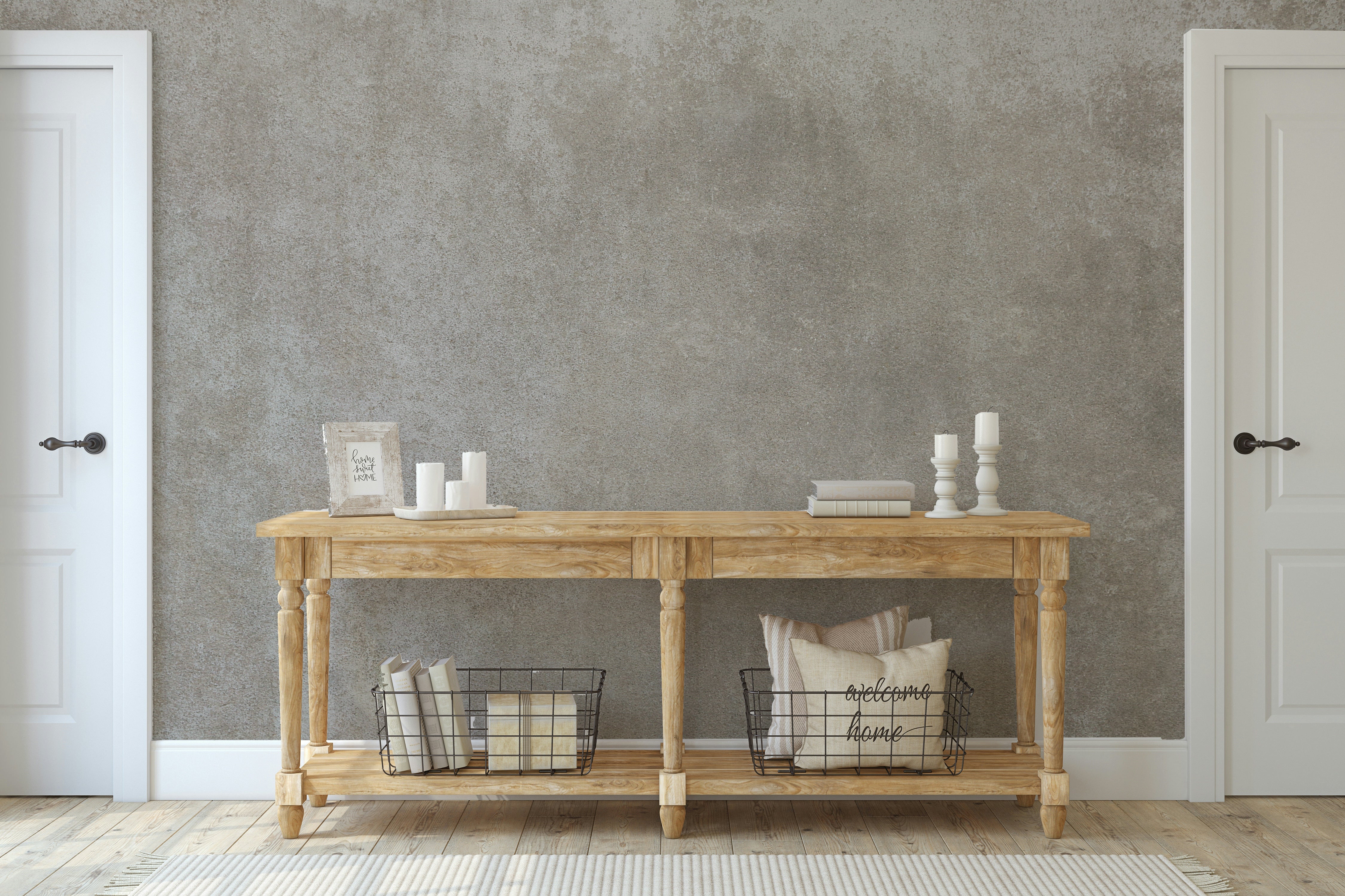 The mural is installed in a rustic living room with simple, wood furniture.

