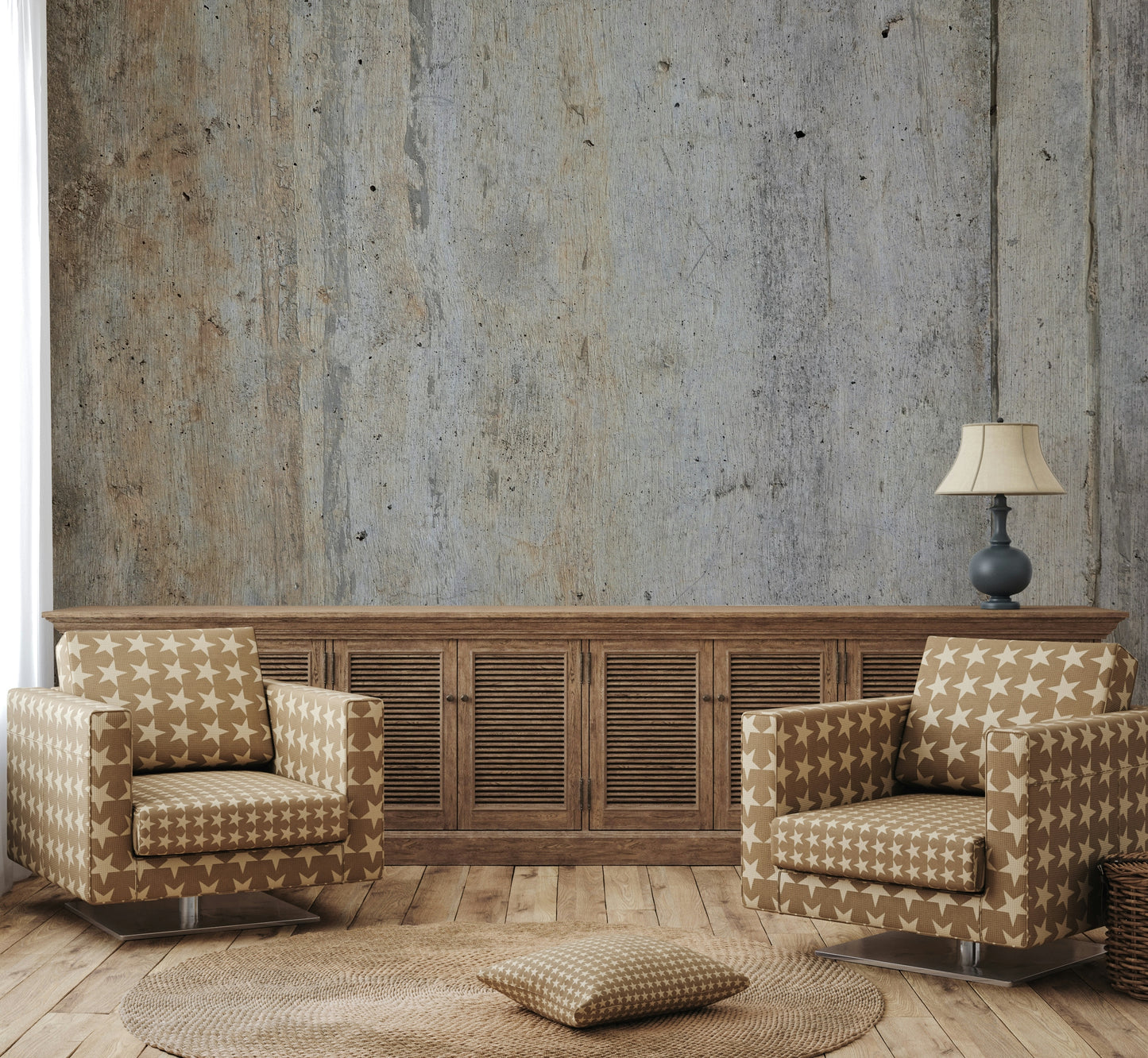 The mural is installed in a modern living room behind a simple, dark sofa.

