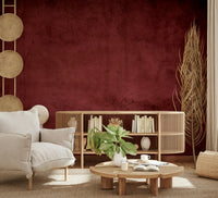 A wall mural featuring a rich, dark burgundy and red-toned texture.

