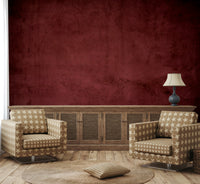 The colors are deep, including various shades of red, maroon, and burgundy.

