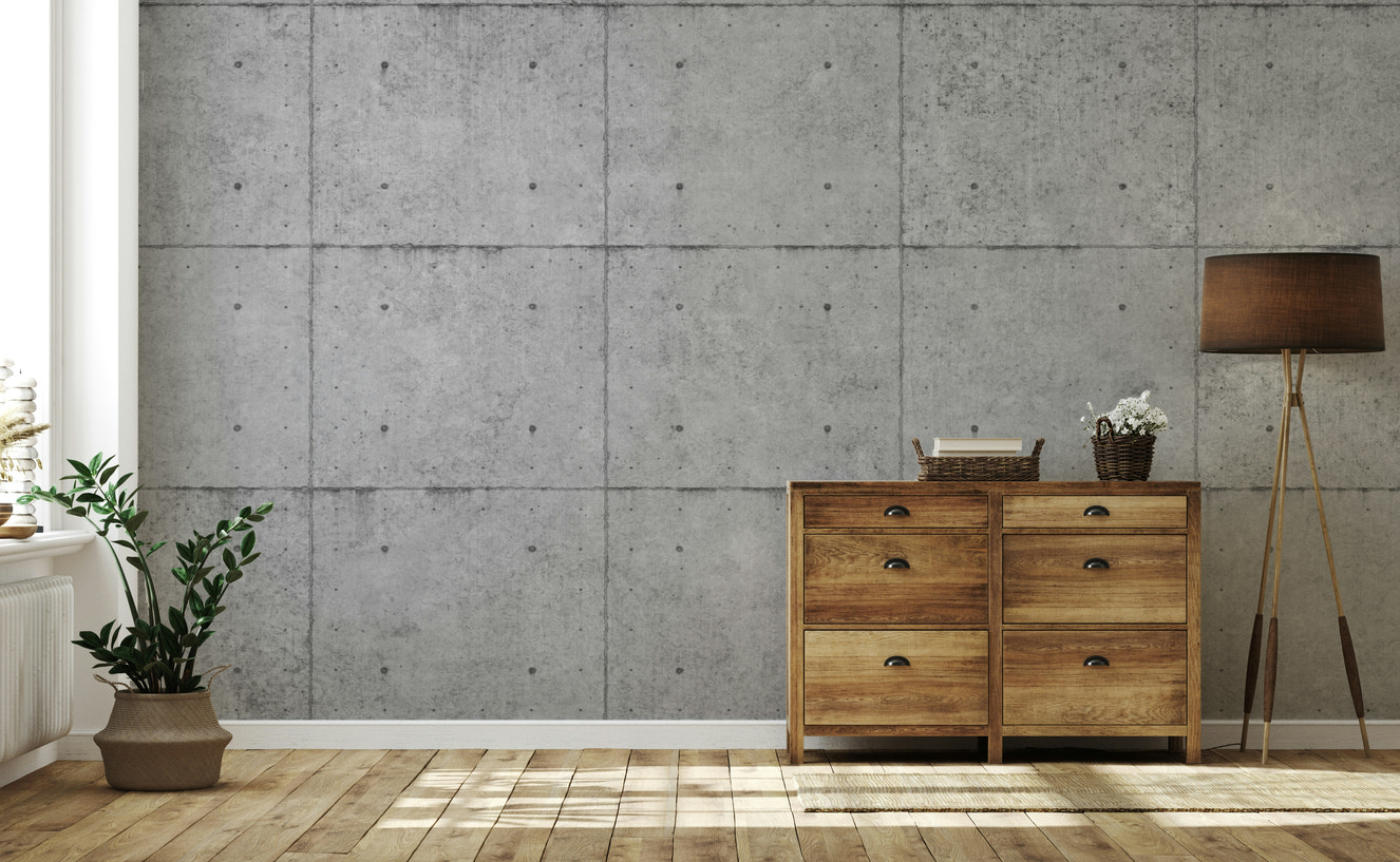A wall mural featuring a raw, modern concrete texture.

