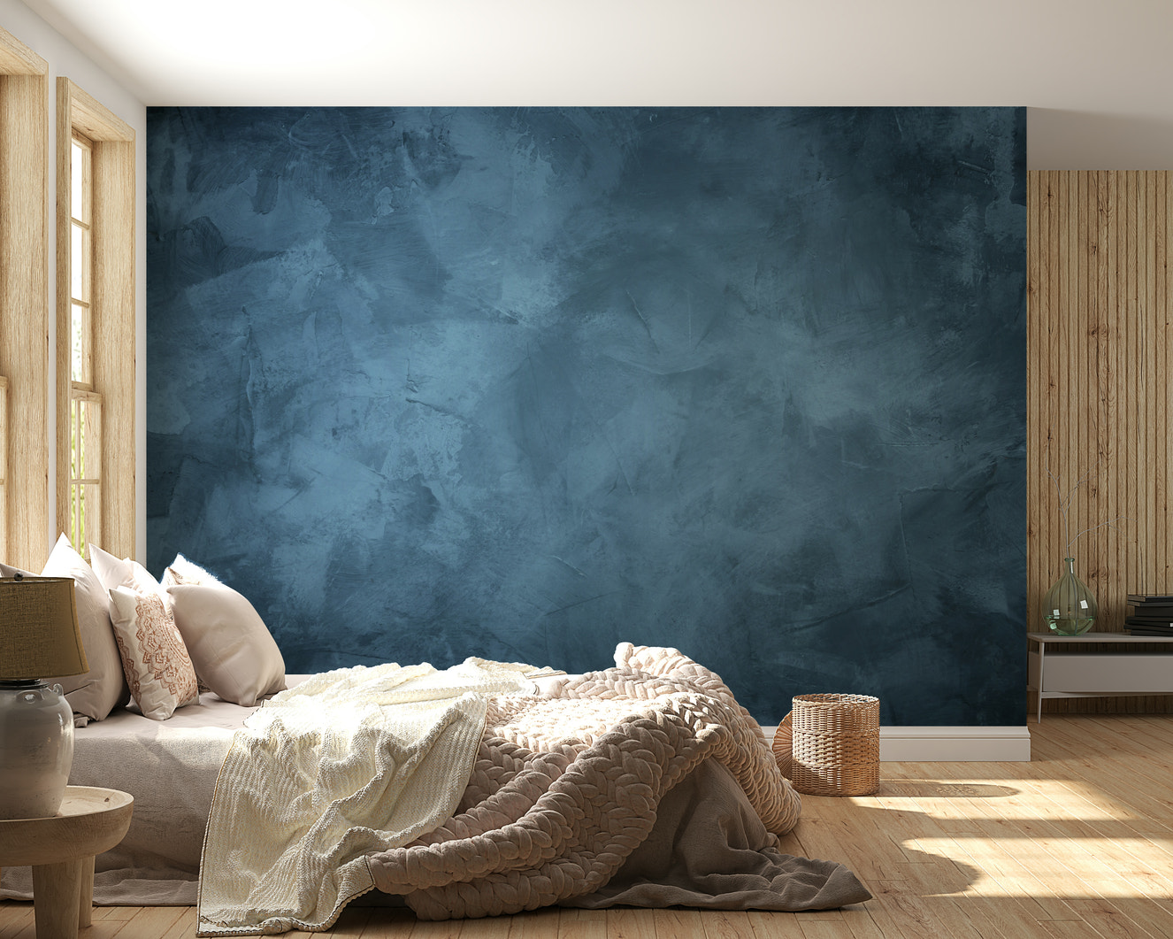 A wall mural featuring a deep, textured pattern in various shades of indigo.


