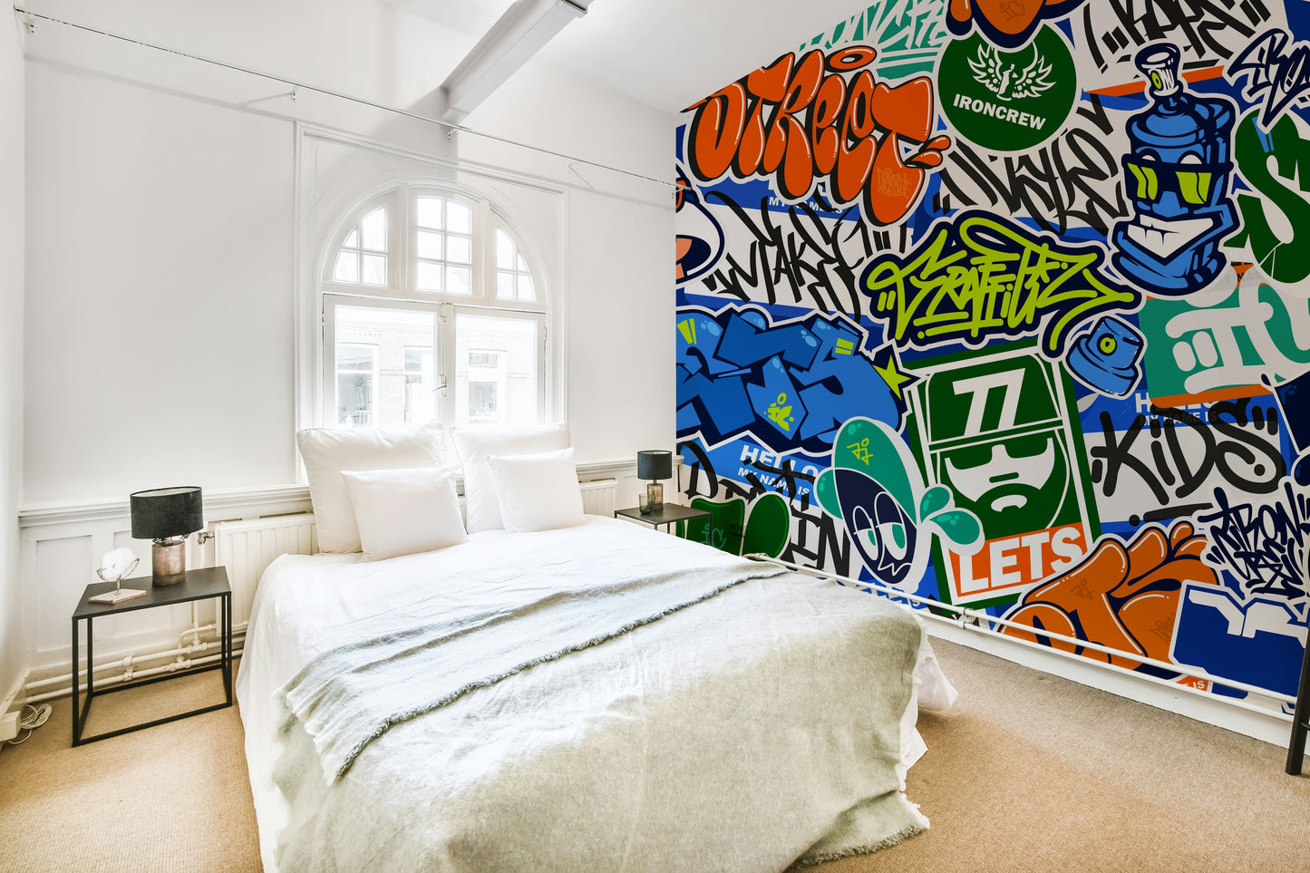 The design has a collage effect with multiple layers of art over one another.

