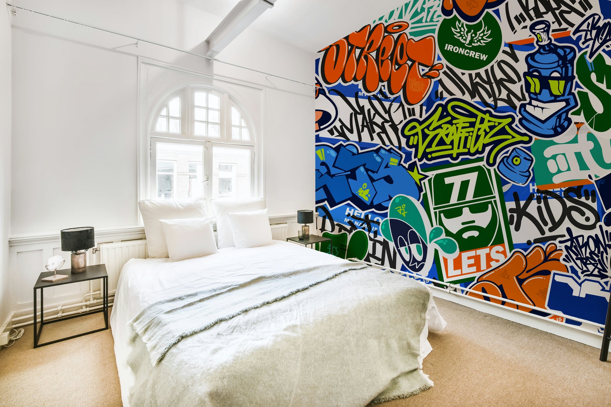 The design has a collage effect with multiple layers of art over one another.

