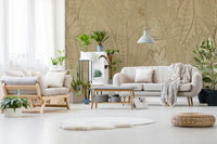 The light in the room highlights the subtle shimmer and texture of the gold leaves.

