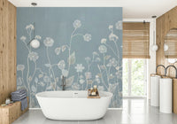 A wall mural of a field of white wildflowers.

