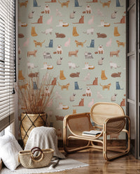 Sage green wall mural with artistic feline characters