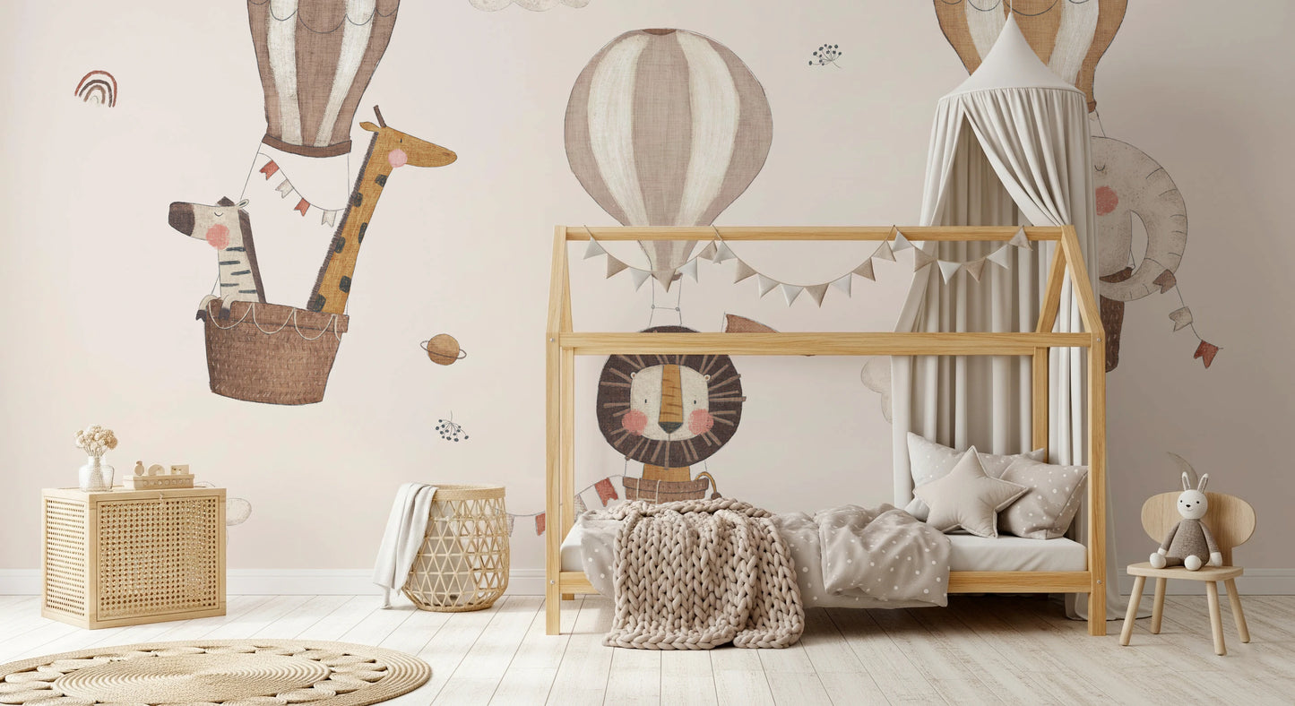 Illustrated lions and zebras on a soft sky background wall mural.